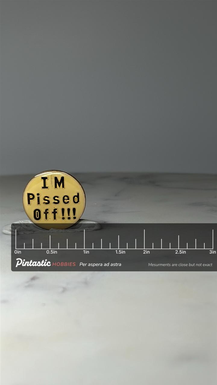 Vintage Im Pissed Off Slogan Pin: Yellow Enamel - Retro Humor Accessory with ruler overlay for size reference