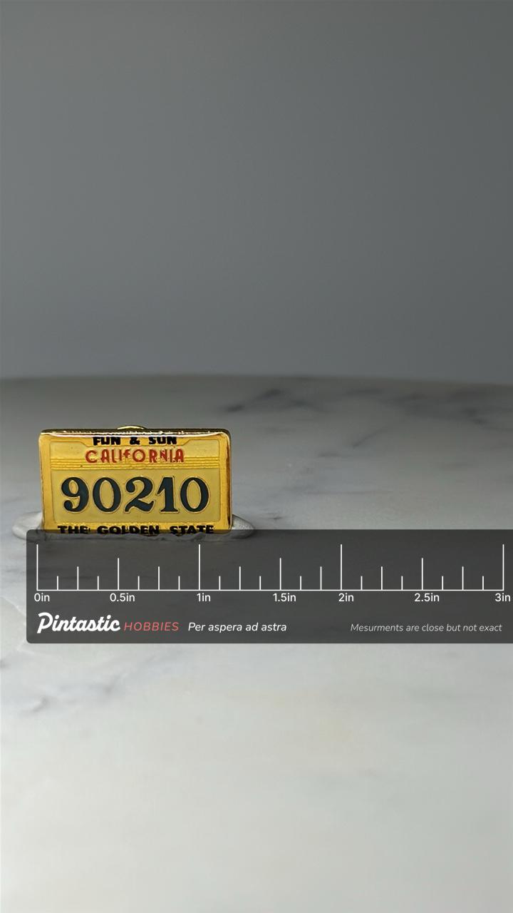 Vintage California License Plate Pin: Yellow Enamel - 90210 Souvenir with ruler overlay for size reference