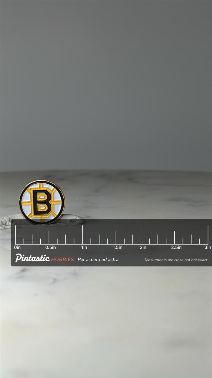 Vintage Boston Bruins Enamel Lapel Pin: Black & Gold - NHL Hockey Accessory with ruler overlay for size reference