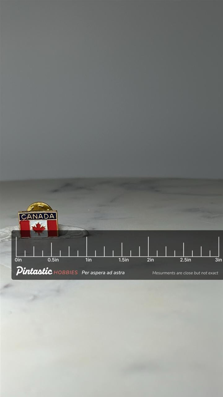 Vintage Canada Flag Enamel Pin: Red White Gold Tone - Travel Souvenir Accessory with ruler overlay for size reference