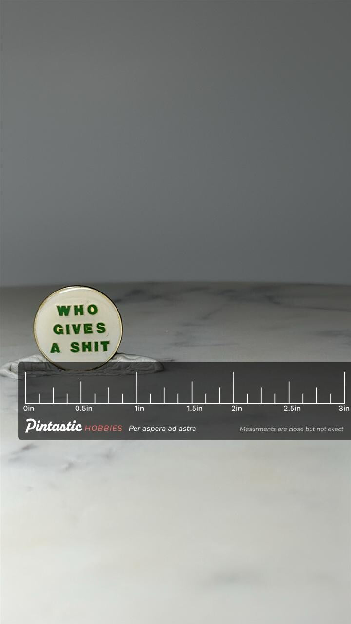 Vintage Novelty Slogan Lapel Pin: White Green Enamel - Retro Accessory with ruler overlay for size reference
