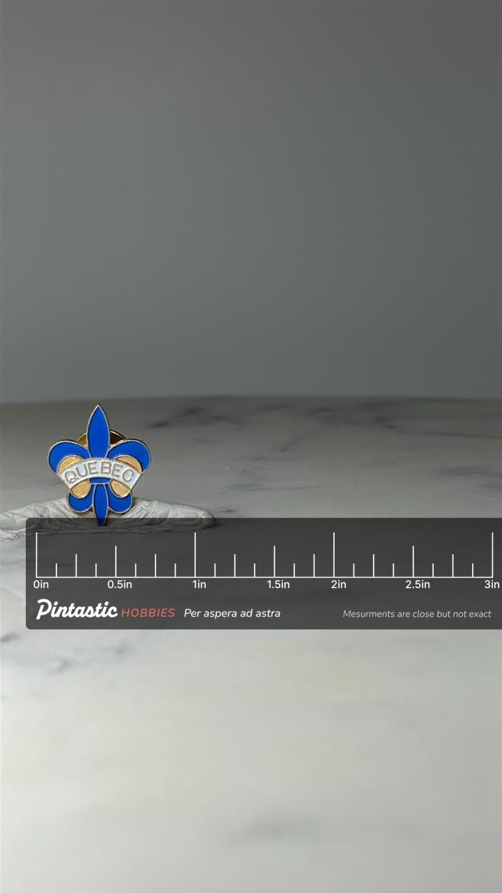 Vintage Quebec Fleur de Lis Lapel Pin: Blue Enamel Gold Tone - Canada Souvenir Accessory with ruler overlay for size referenc