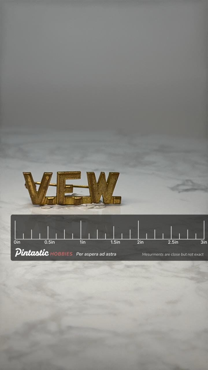 Vintage V.F.W. Letter Pin: Gold Tone - Patriotic Accessory with ruler overlay for size reference