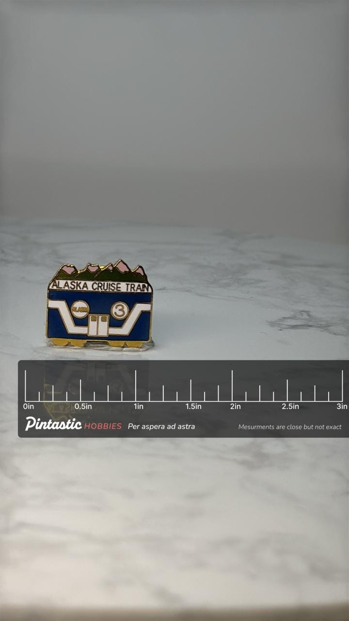 Vintage Alaska Cruise Train Enamel Pin: Blue Gold - Travel Souvenir Accessory with ruler overlay for size reference