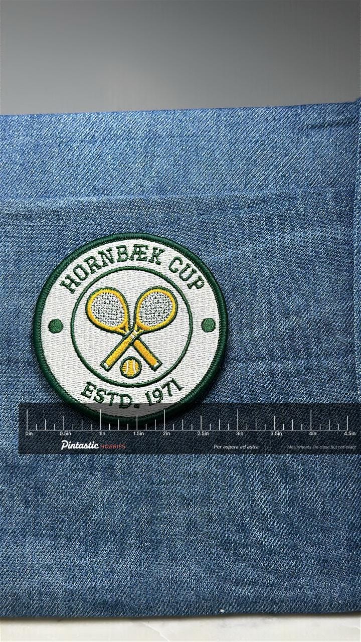 Hornbek Cup Patch: Green White Tennis - 1971 Sports Accessory with ruler overlay for size reference