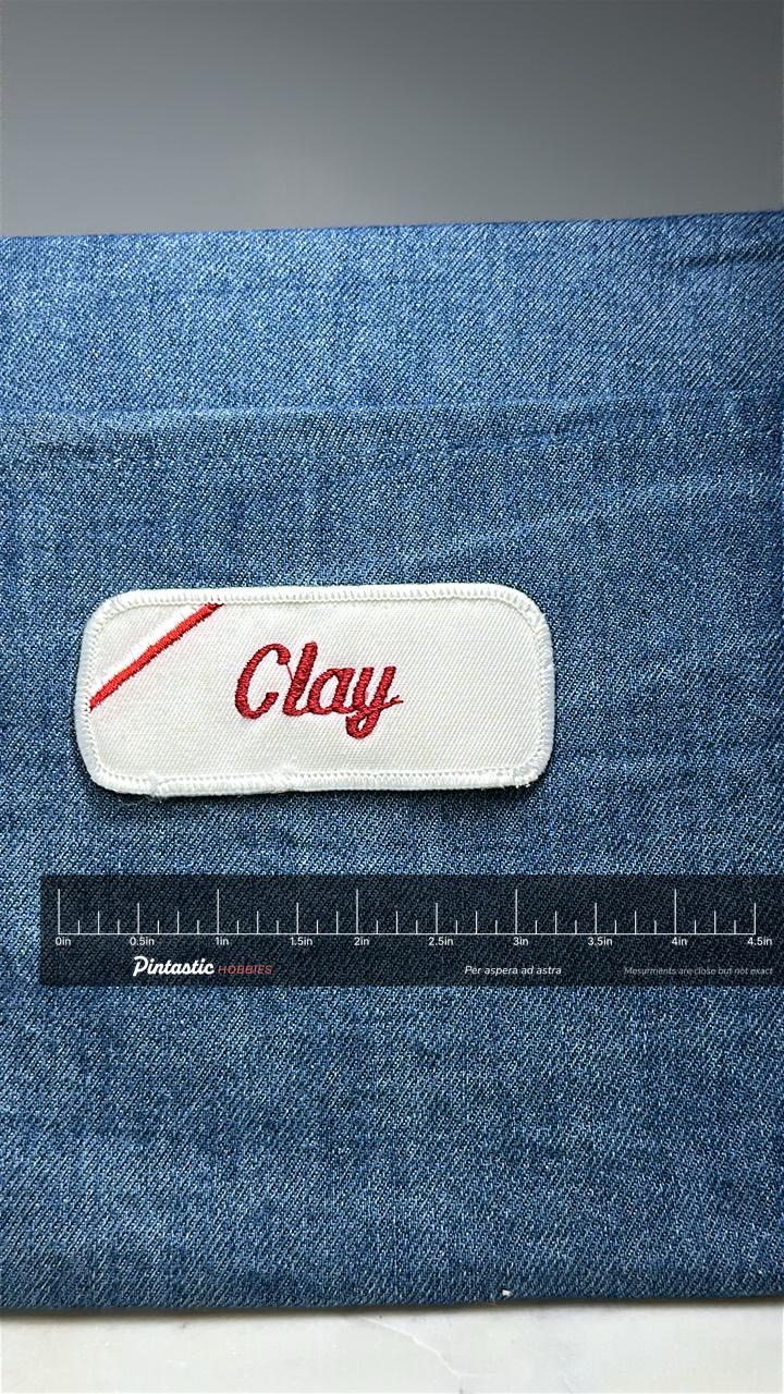 Clay Name Patch: Red Script on White - Vintage Uniform Accessory with ruler overlay for size reference