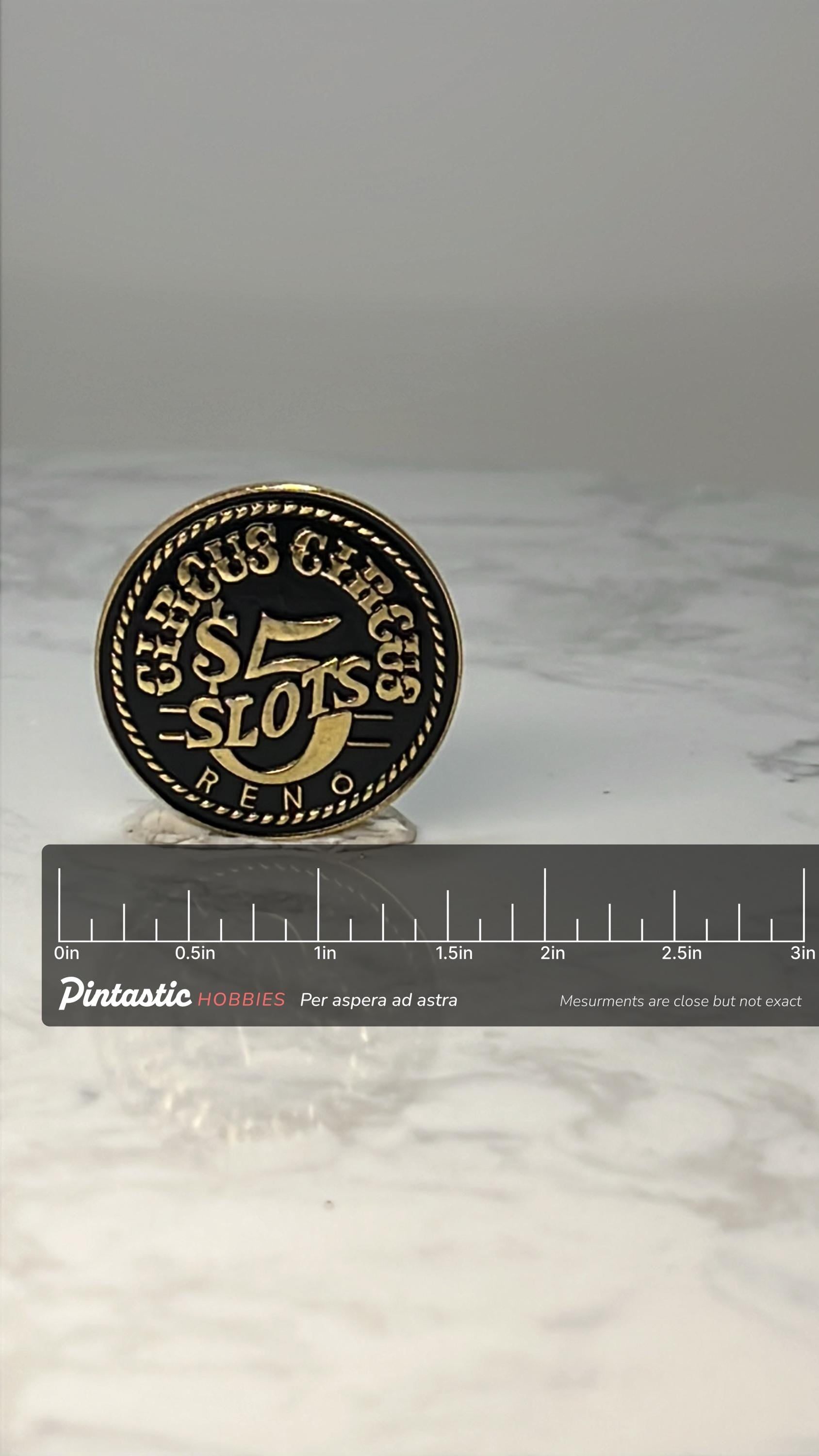 Vintage Circus Circus Slot Machine Pin: Black Gold - Reno Casino Accessory with ruler overlay for size reference