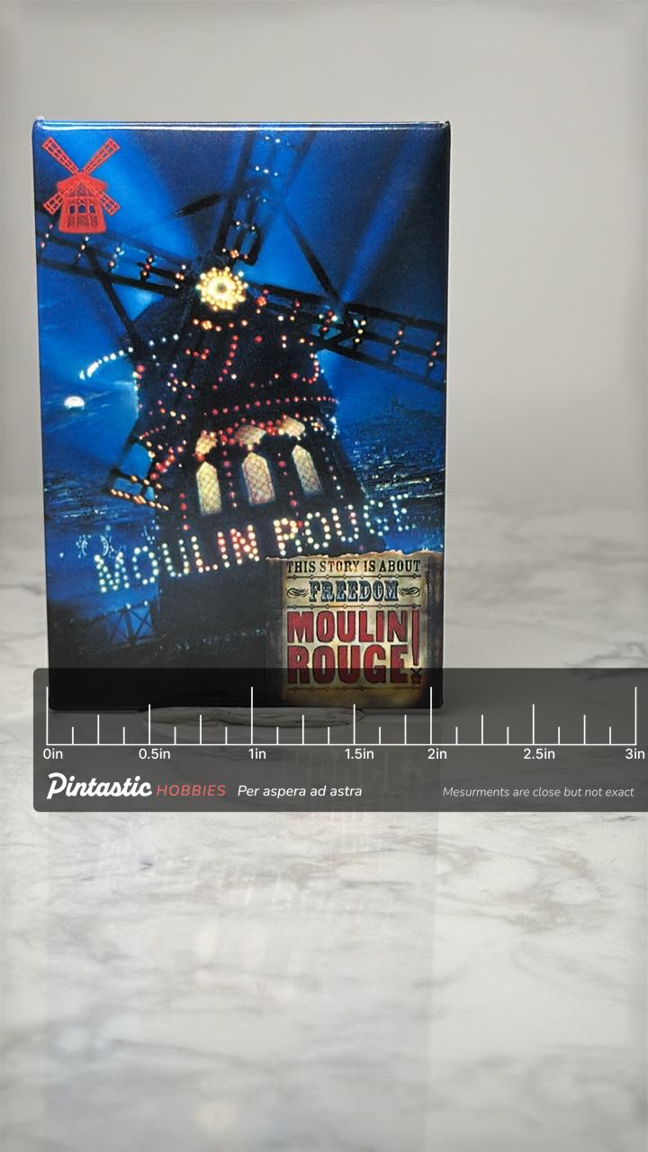 Vintage Moulin Rouge Windmill Pin: Glossy Enamel - Movie Musical Souvenir with ruler overlay for size reference