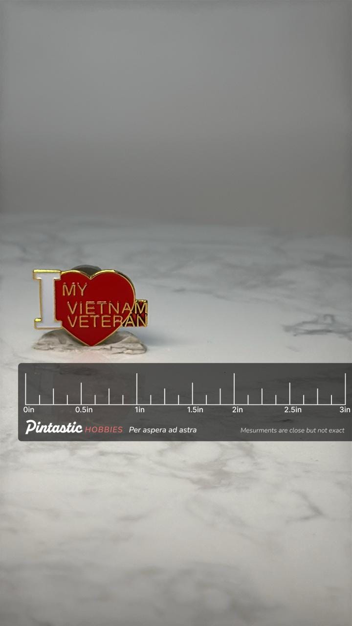 Vintage Vietnam Veteran Lapel Pin: Red Heart Gold Tone - Patriotic Accessory with ruler overlay for size reference