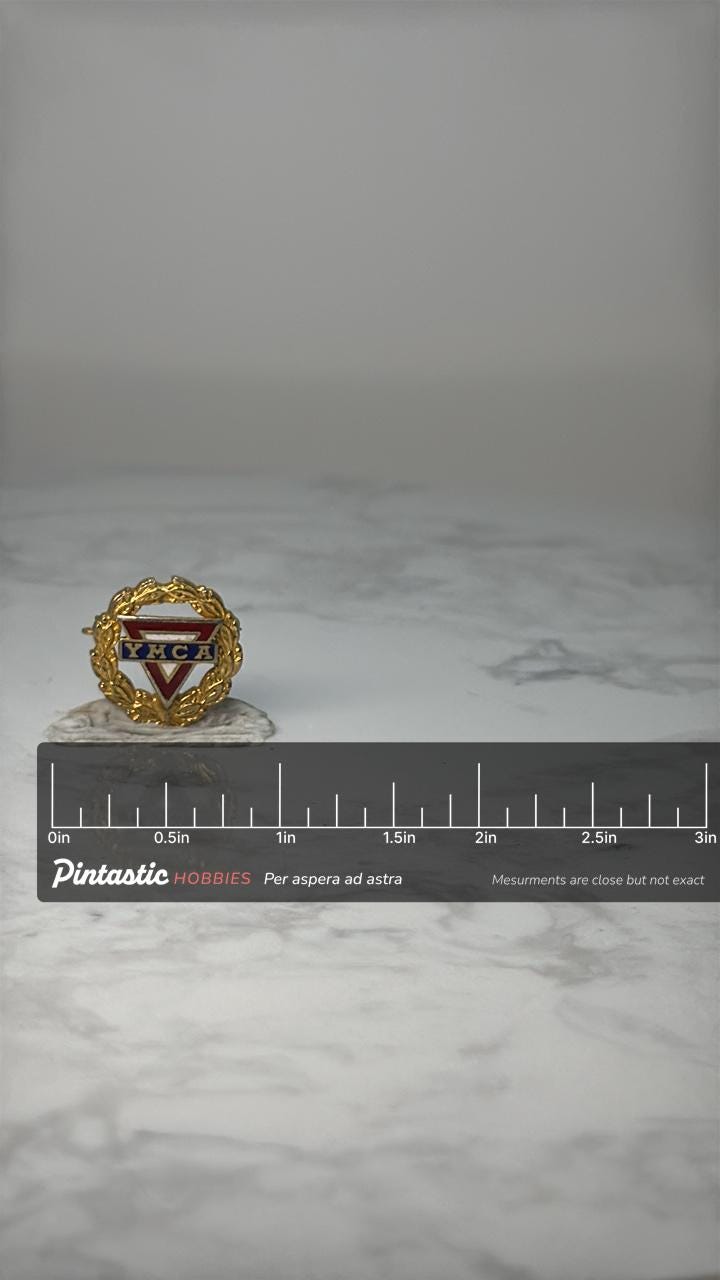 Vintage YMCA Logo Enamel Pin: Gold Laurel Wreath - Fraternal Accessory with ruler overlay for size reference
