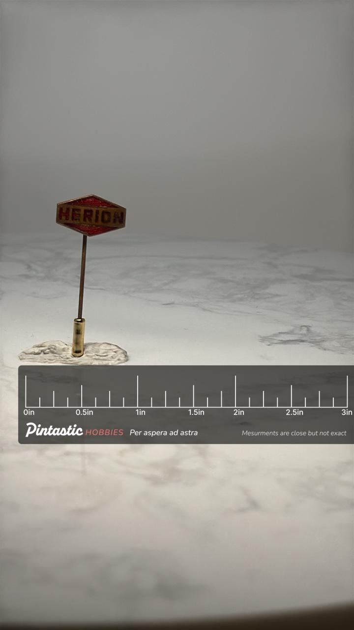 Vintage Herion Company Stick Pin: Red Enamel Gold Tone - Industrial Accessory with ruler overlay for size reference