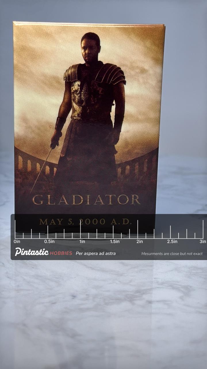 Vintage Gladiator Movie Promo Pin: Gold Tone Photo Print - 2000 Film Accessory with ruler overlay for size reference