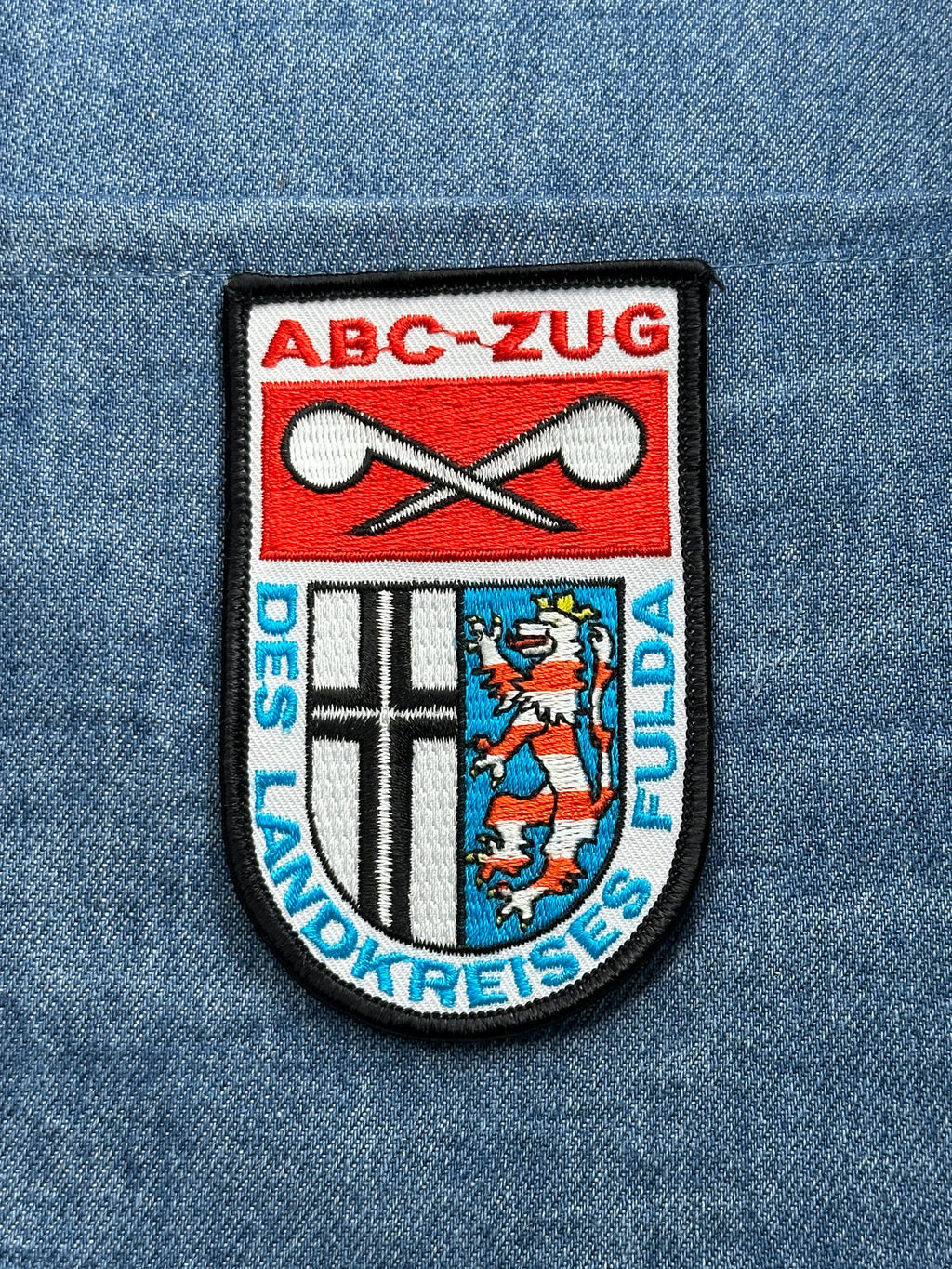 ABC-ZUG Fulda Patch: Red Shield Crest - German Civil Defense Accessory