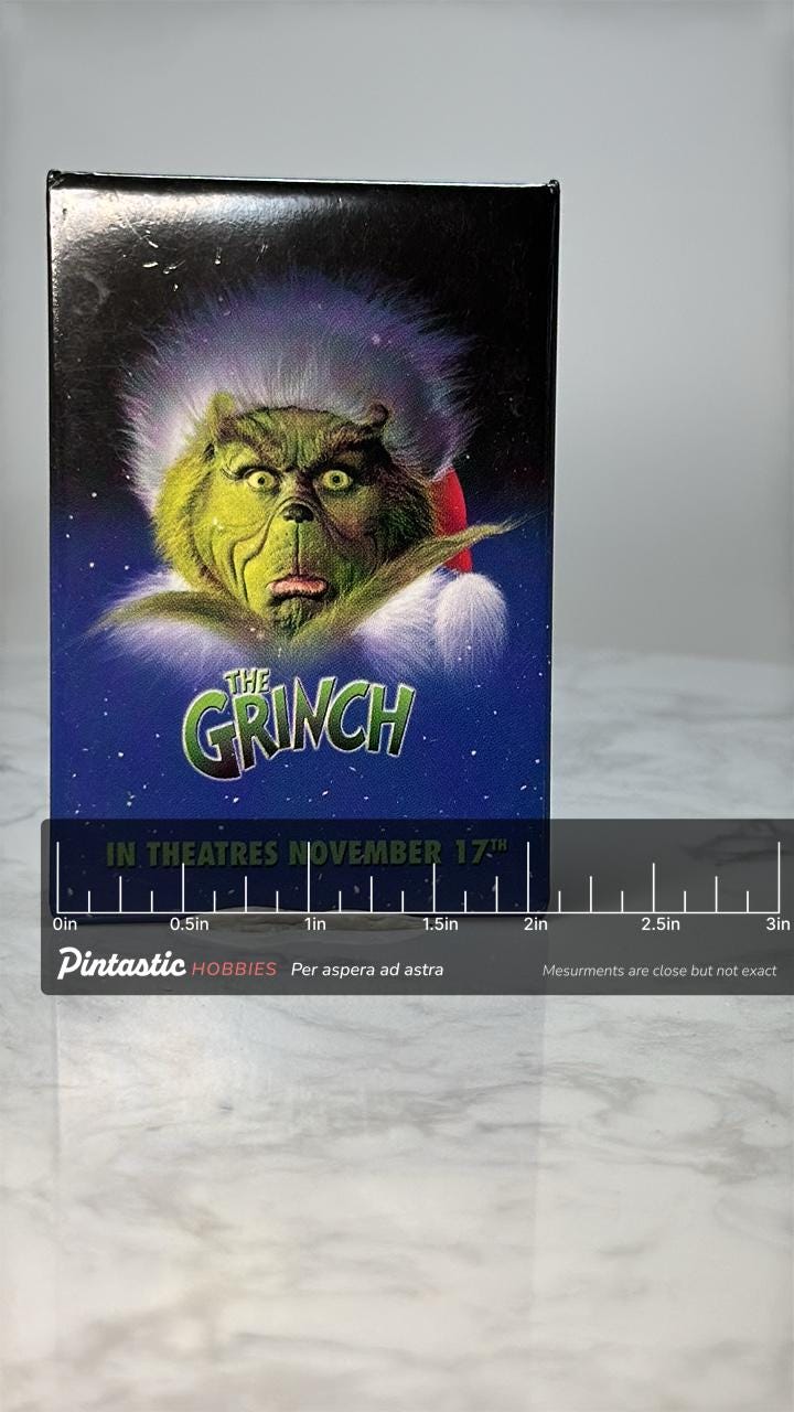 Vintage The Grinch Movie Pin: Glossy Color Promo - Christmas Film Accessory with ruler overlay for size reference