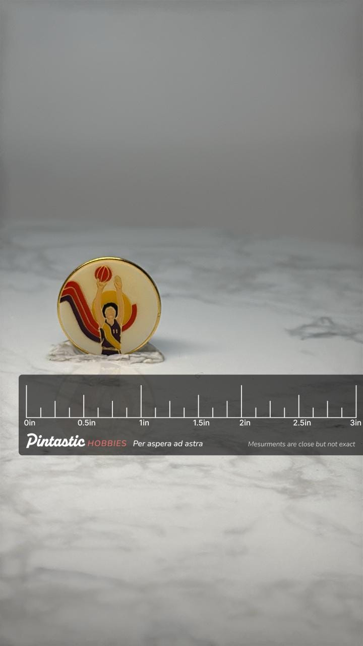 Vintage Basketball Player Lapel Pin: Enamel Retro - 1970s Sports Accessory with ruler overlay for size reference