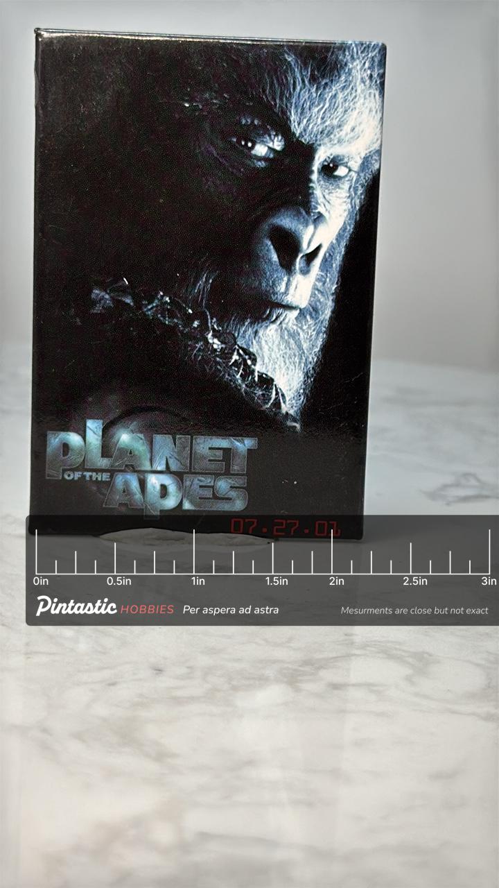 Vintage Planet of the Apes Movie Pin: Glossy Film Promo - 2000s Sci Fi Accessory with ruler overlay for size reference