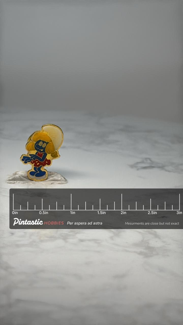 Vintage Smurfette Enamel Lapel Pin: Gold Tone - 1980s Cartoon Accessory with ruler overlay for size reference