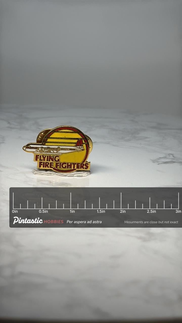 Vintage Flying Firefighters Enamel Pin: Red Yellow Gold - Aviation Accessory with ruler overlay for size reference