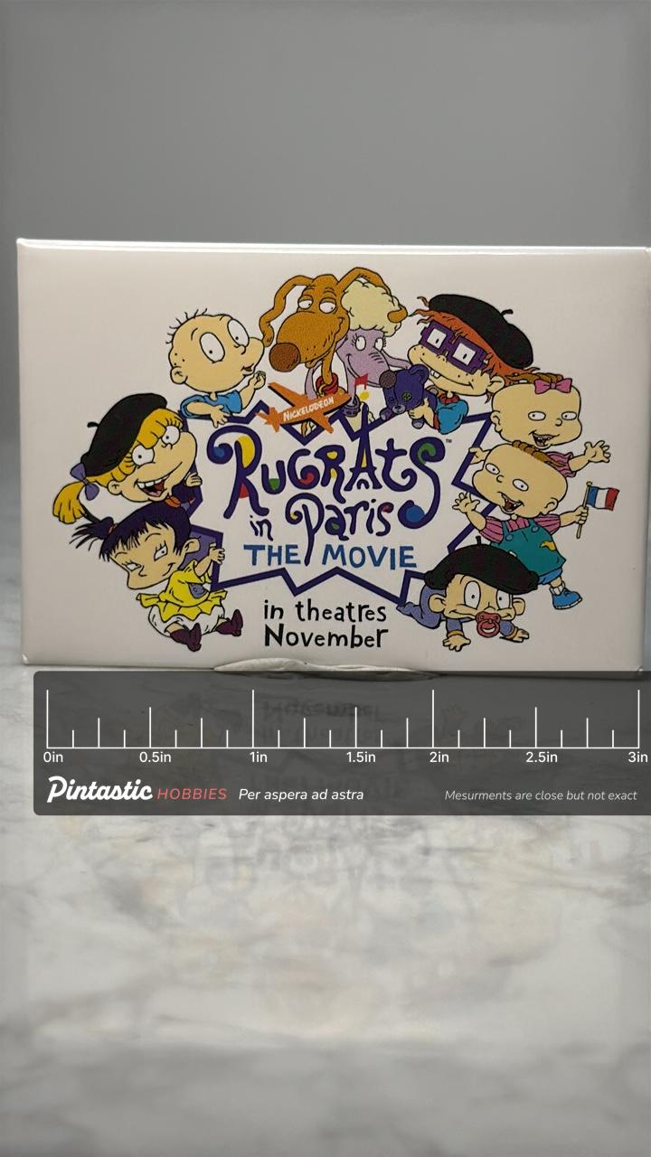 Vintage Rugrats in Paris Movie Pin: Colorful Enamel - 2000s Nickelodeon Accessory with ruler overlay for size reference