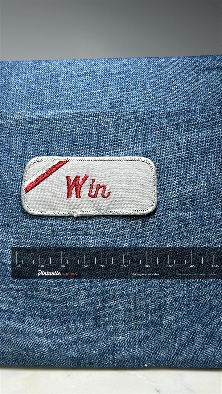 Win Name Patch: Red Script on White - Vintage Uniform Accessory with ruler overlay for size reference