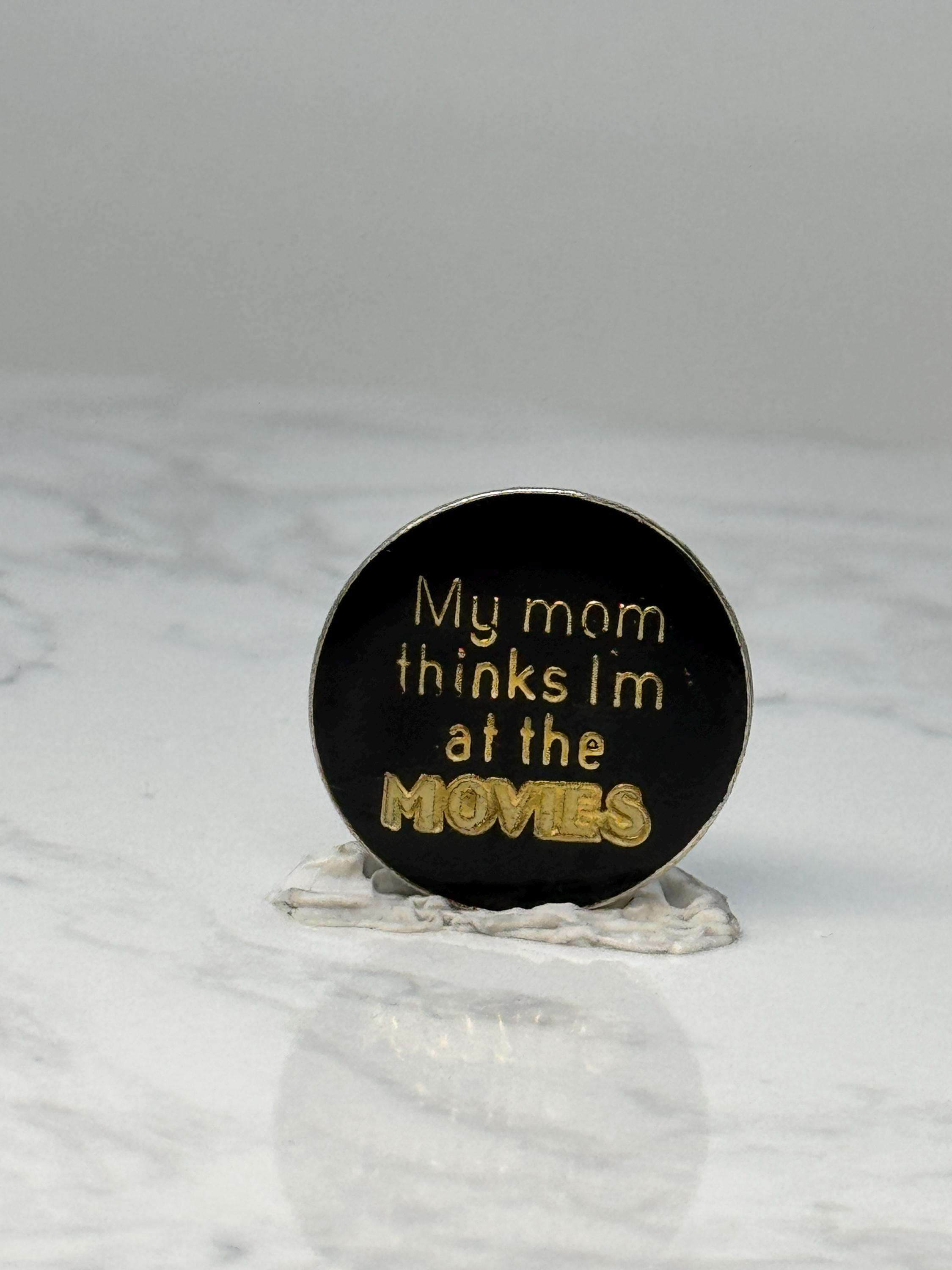 Vintage Movie Humor Lapel Pin: Black & Gold - 1980s Novelty Accessory