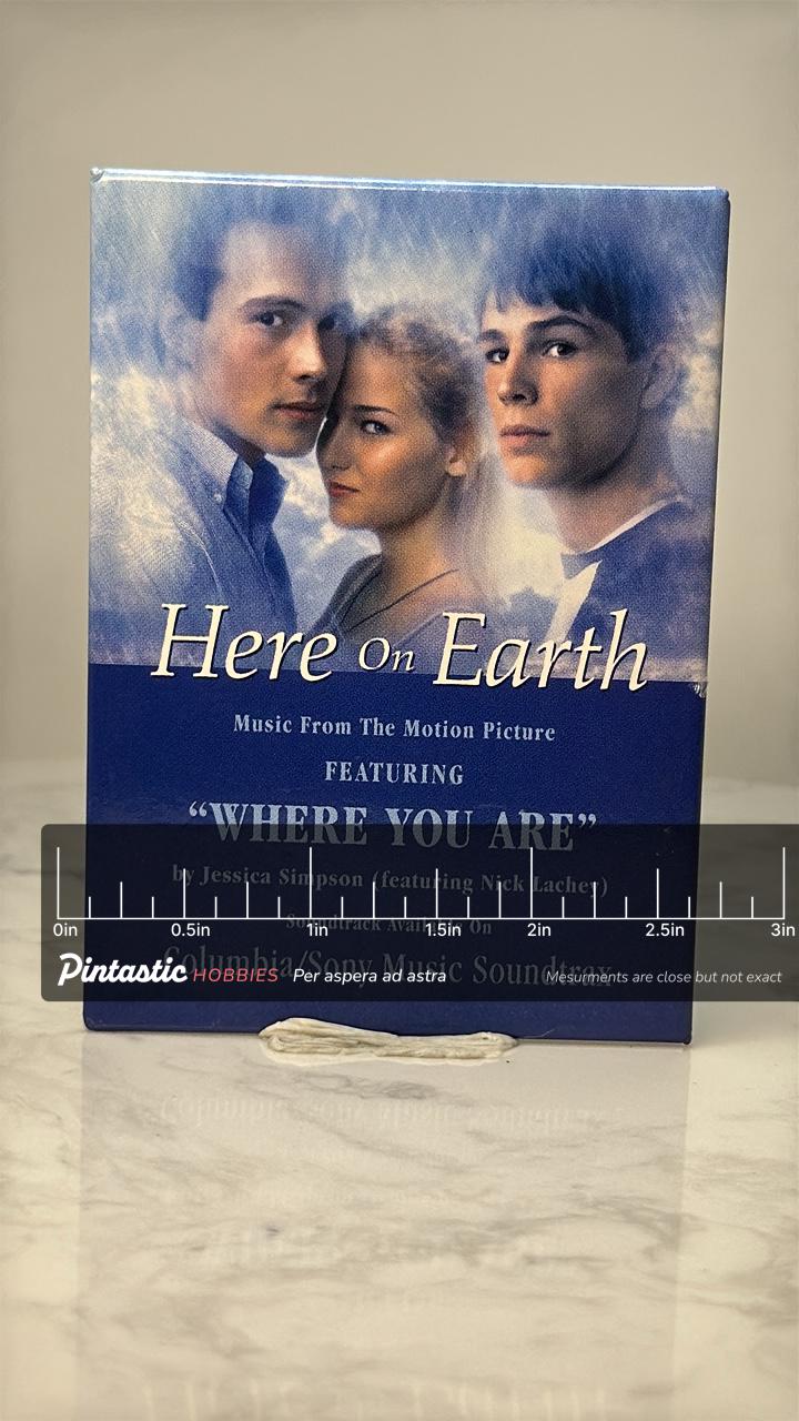 Vintage Here on Earth Movie Pin: Blue Enamel - 1990s Film Accessory with ruler overlay for size reference