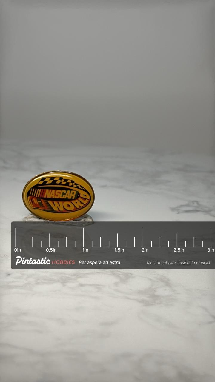 Vintage NASCAR World Oval Pin: Yellow Enamel - Racing Fan Accessory with ruler overlay for size reference
