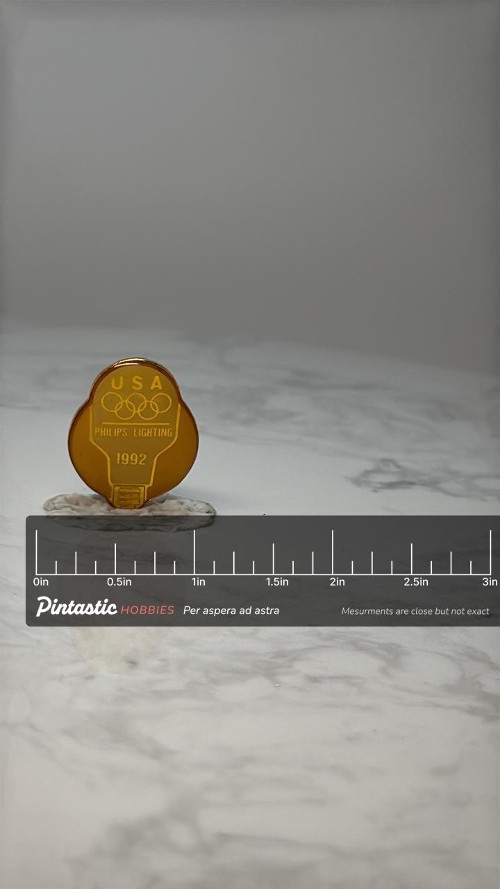 Vintage 1992 USA Olympics Philips Lighting Pin: Gold Tone with ruler overlay for size reference