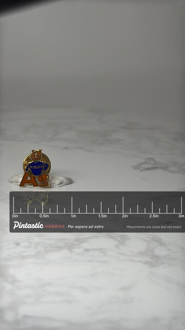 Vintage Auburn Tigers Mascot Enamel Pin: Orange & Blue - College Sports Accessory with ruler overlay for size reference