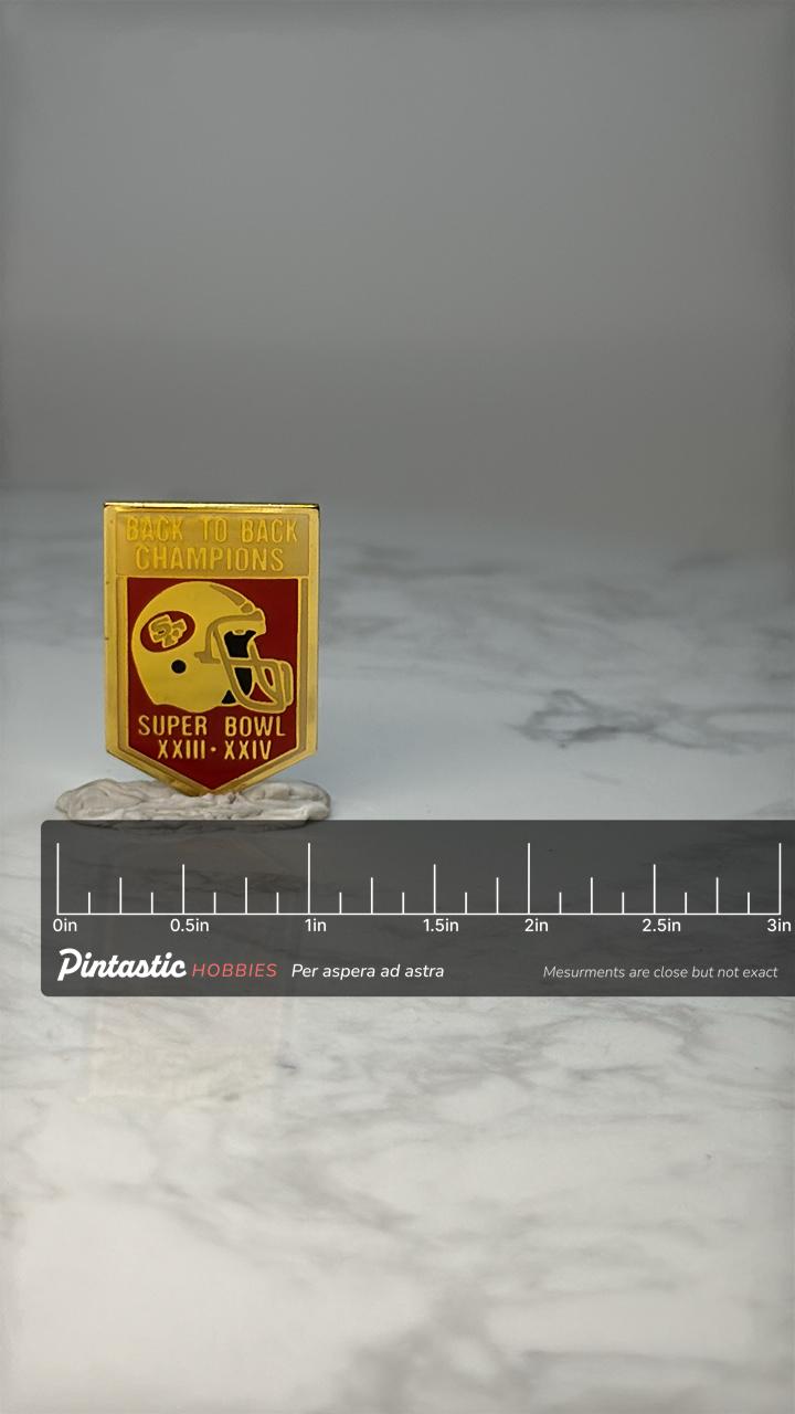 Vintage 49ers Helmet Pin: Gold Tone Enamel - Super Bowl Champs with ruler overlay for size reference