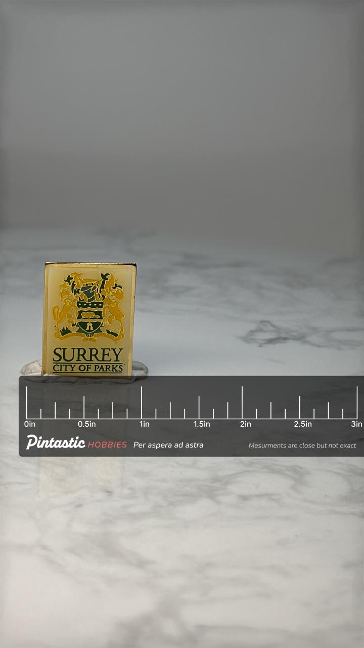Vintage Surrey City Pin: Gold Tone Enamel - City of Parks Souvenir Accessory with ruler overlay for size reference