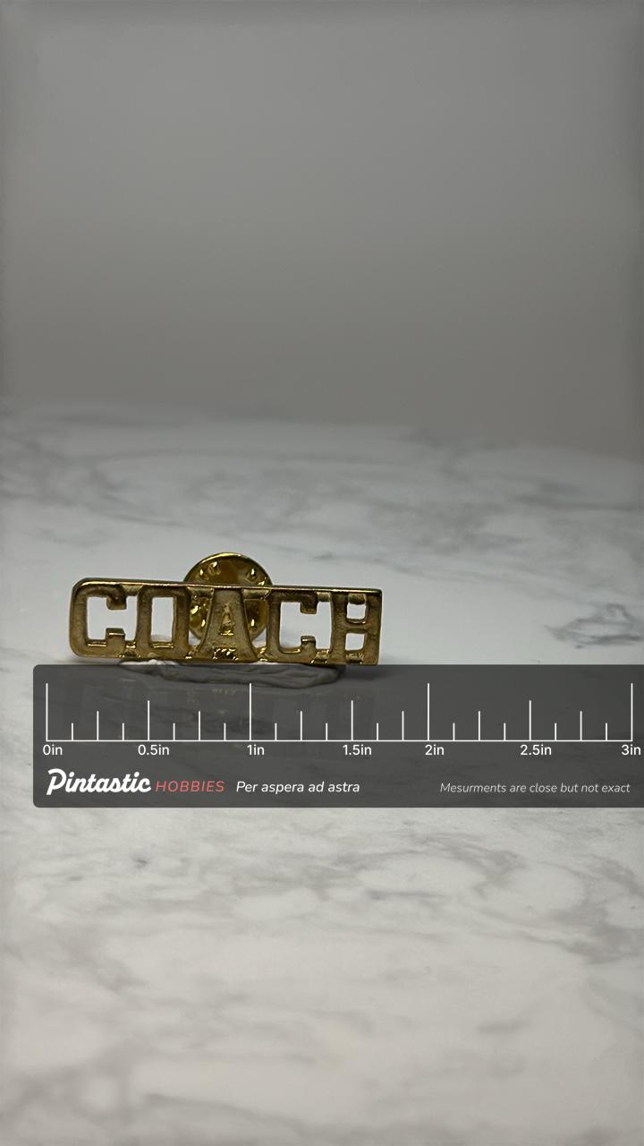 Vintage Coach Word Pin: Gold Tone Metal - Sports Team Accessory with ruler overlay for size reference