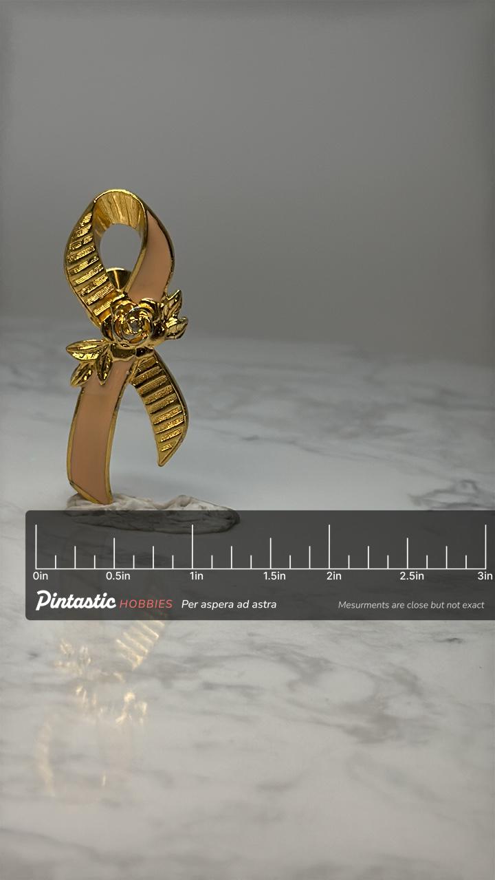 Awareness Ribbon Pin: Gold Tone Pink Enamel - Cancer Support Accessory with ruler overlay for size reference