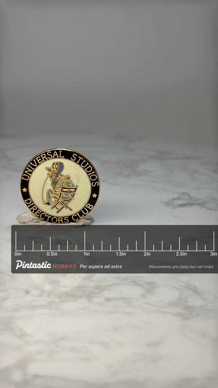 Vintage Universal Studios Directors Club Pin: Black Enamel - Film Accessory with ruler overlay for size reference