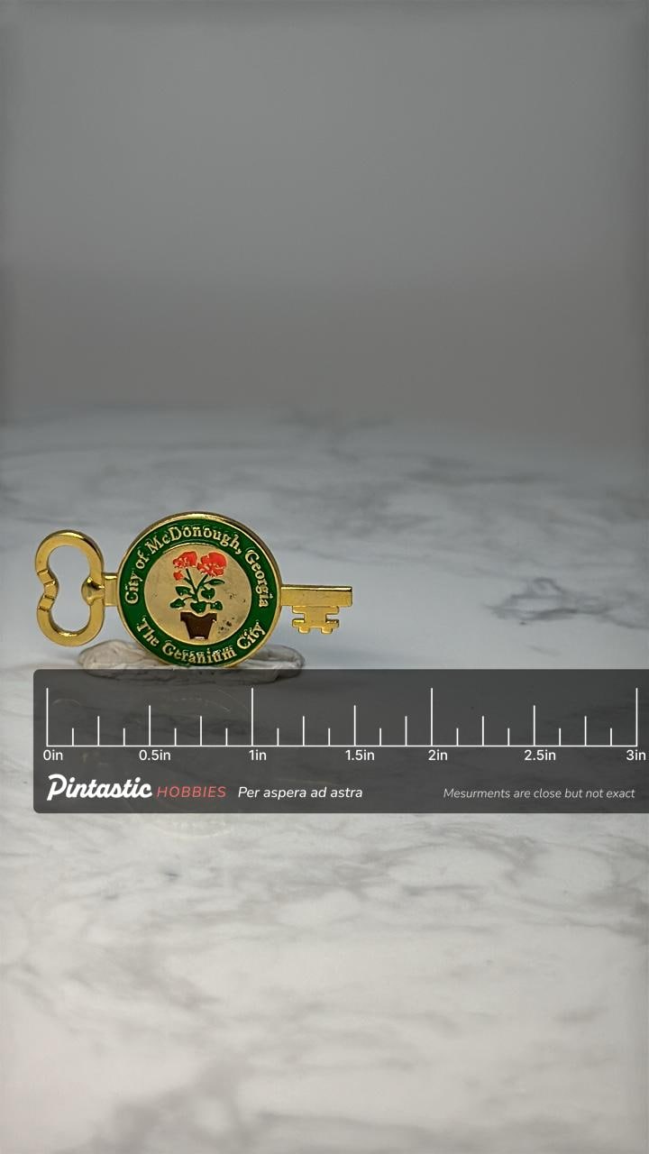 Vintage McDonough Georgia Key Pin: Gold Enamel - City Souvenir Accessory with ruler overlay for size reference