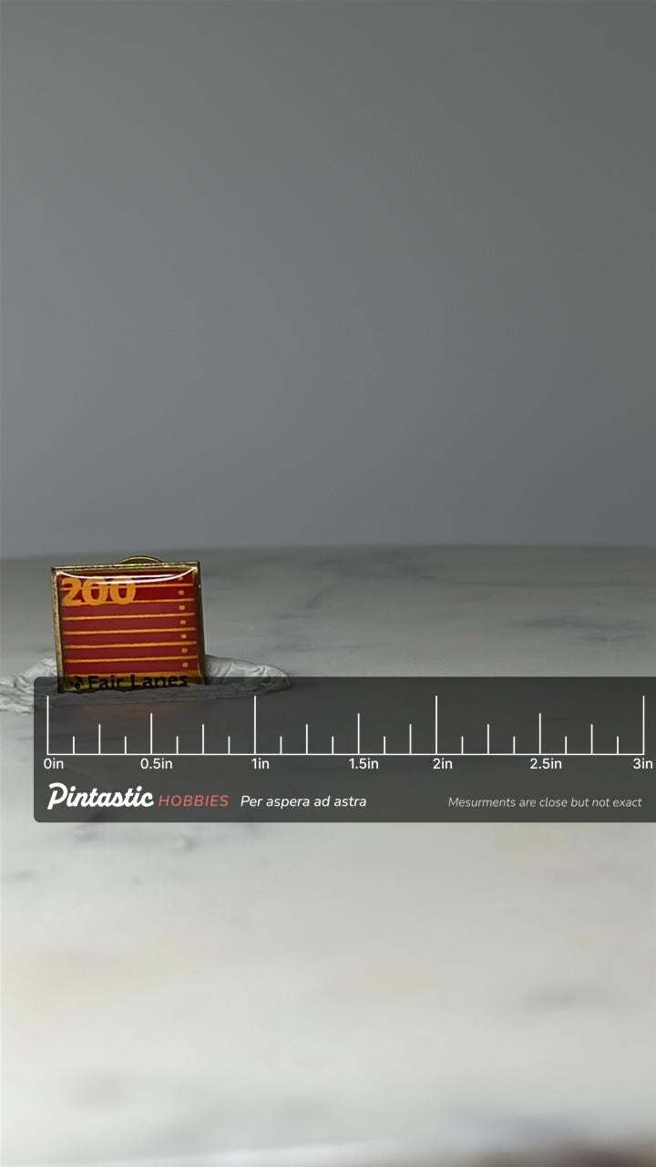 Vintage Fair Lanes 200 Score Pin: Red Enamel Gold Tone - Bowling Award Accessory with ruler overlay for size reference