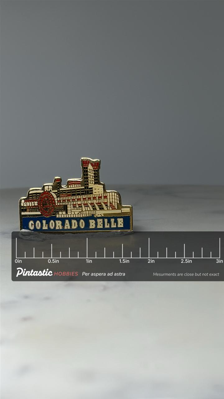Vintage Colorado Belle Riverboat Pin: Gold Enamel - Casino Souvenir Accessory with ruler overlay for size reference