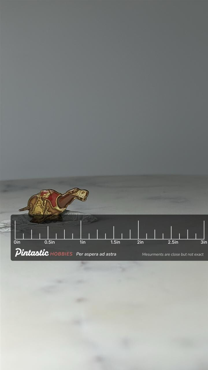Vintage Greyhound Racing Pin: Gold Tone Enamel - Sporting Collectible Accessory with ruler overlay for size reference