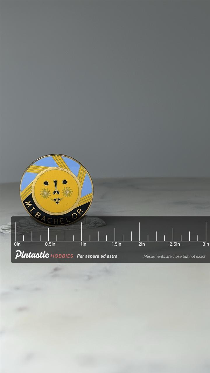 Vintage Mt Bachelor Ski Pin: Yellow & Blue Enamel - Oregon Resort with ruler overlay for size reference