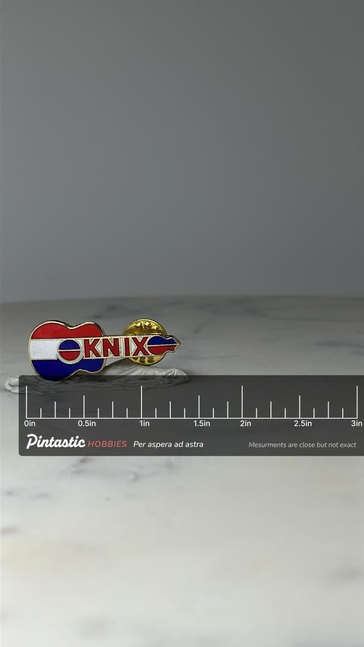 Vintage KNIX Radio Guitar Pin: Red White Blue Enamel - 90s Music Accessory with ruler overlay for size reference