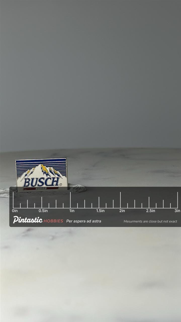 Vintage Busch Beer Logo Lapel Pin: Enamel Mountain Design - 1980s Bar Accessory with ruler overlay for size reference