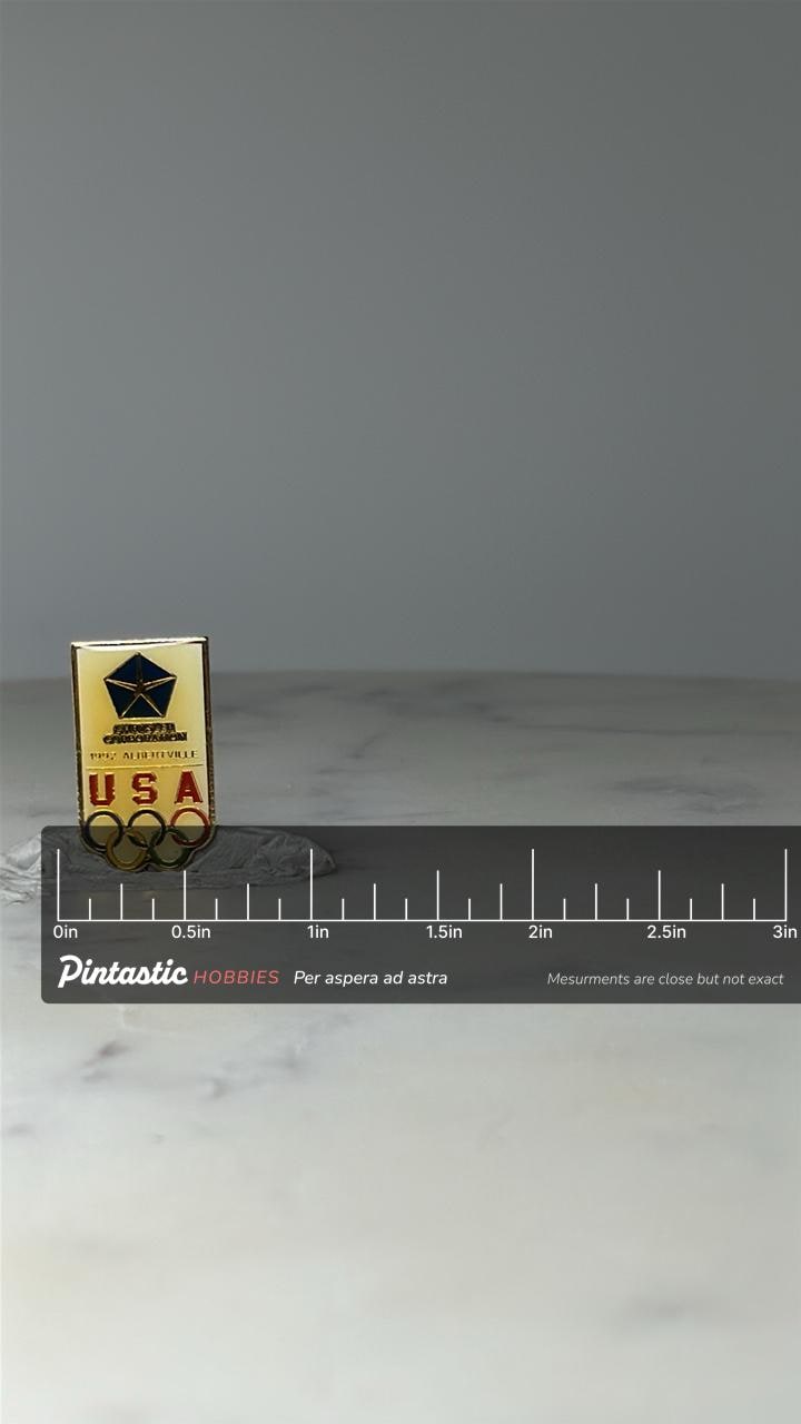 Vintage Chrysler USA Olympic Pin: Gold Enamel - 1992 Albertville Accessory with ruler overlay for size reference