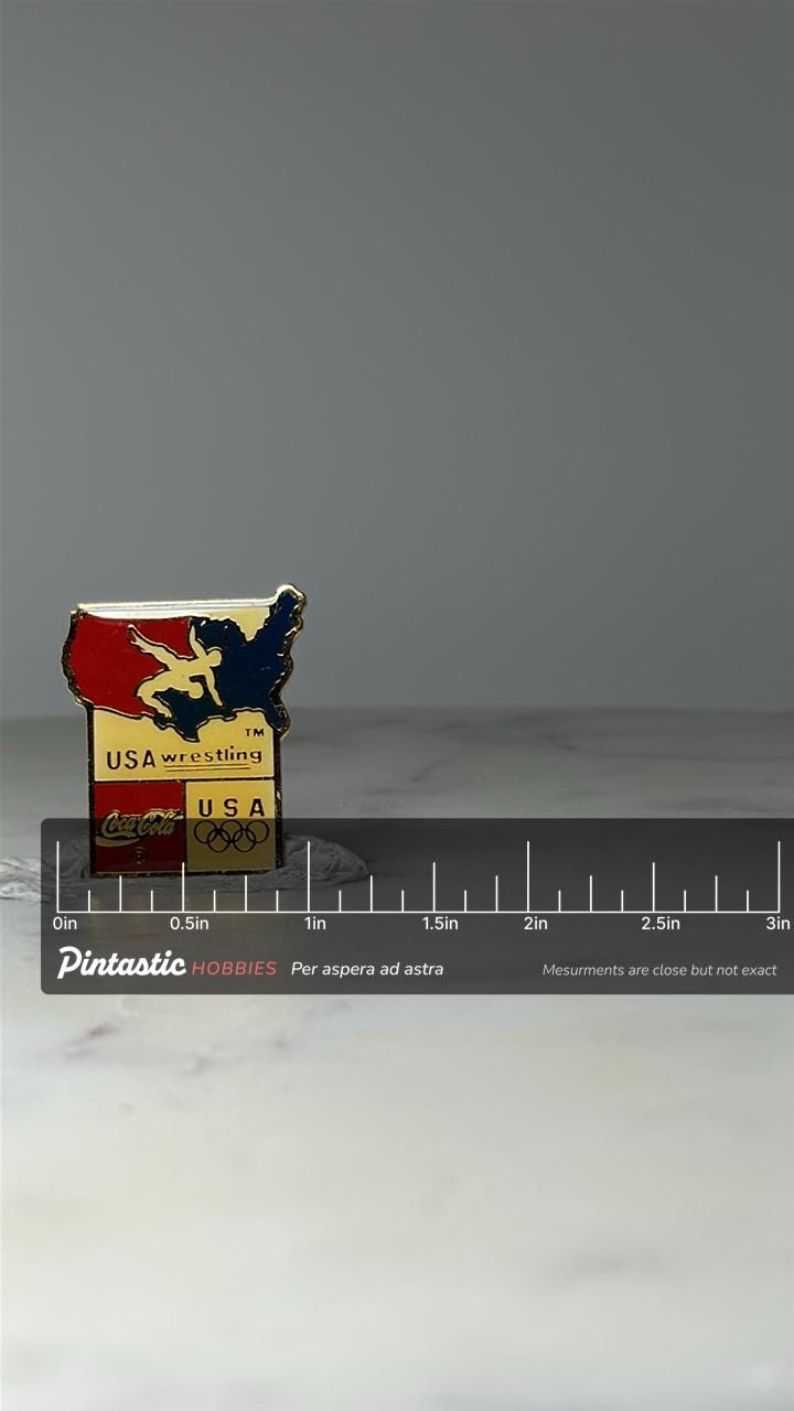 Vintage USA Wrestling Enamel Pin: Red White Blue - Olympic Era Accessory with ruler overlay for size reference