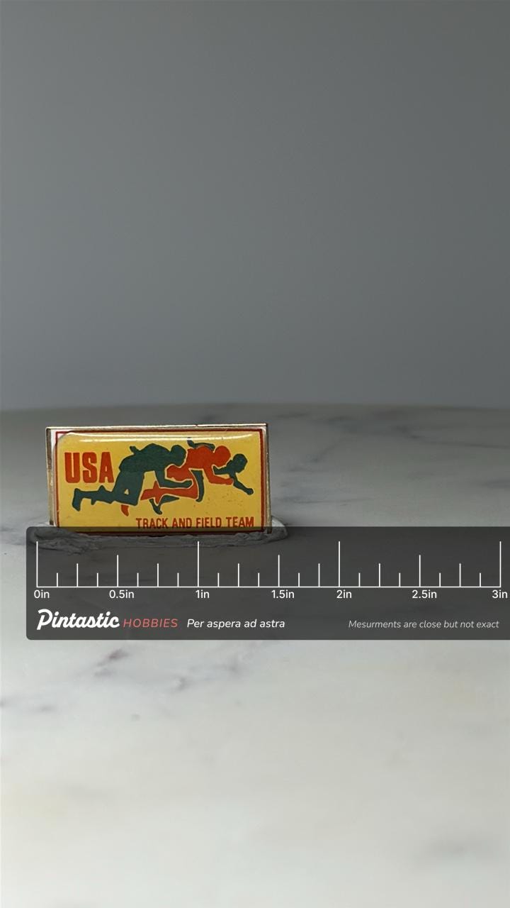 Vintage USA Track and Field Team Pin: Enamel Sports - Olympic Era Accessory with ruler overlay for size reference