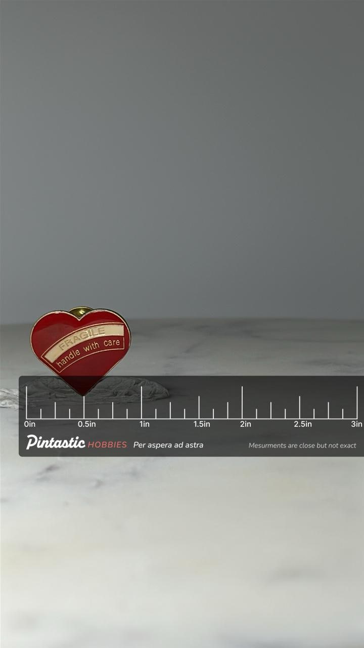 Vintage Heart Enamel Lapel Pin: Red Gold Tone - Fragile Theme Accessory with ruler overlay for size reference