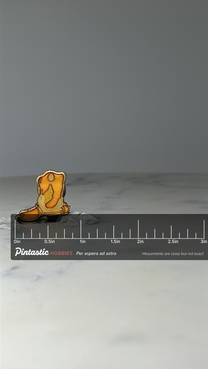 Vintage Cowboy Boot Enamel Pin: Gold Tone Orange Western Accessory with ruler overlay for size reference