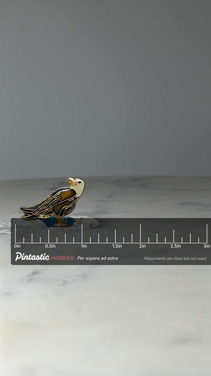 Vintage Bald Eagle Enamel Pin: Gold Tone - Patriotic Bird Accessory with ruler overlay for size reference