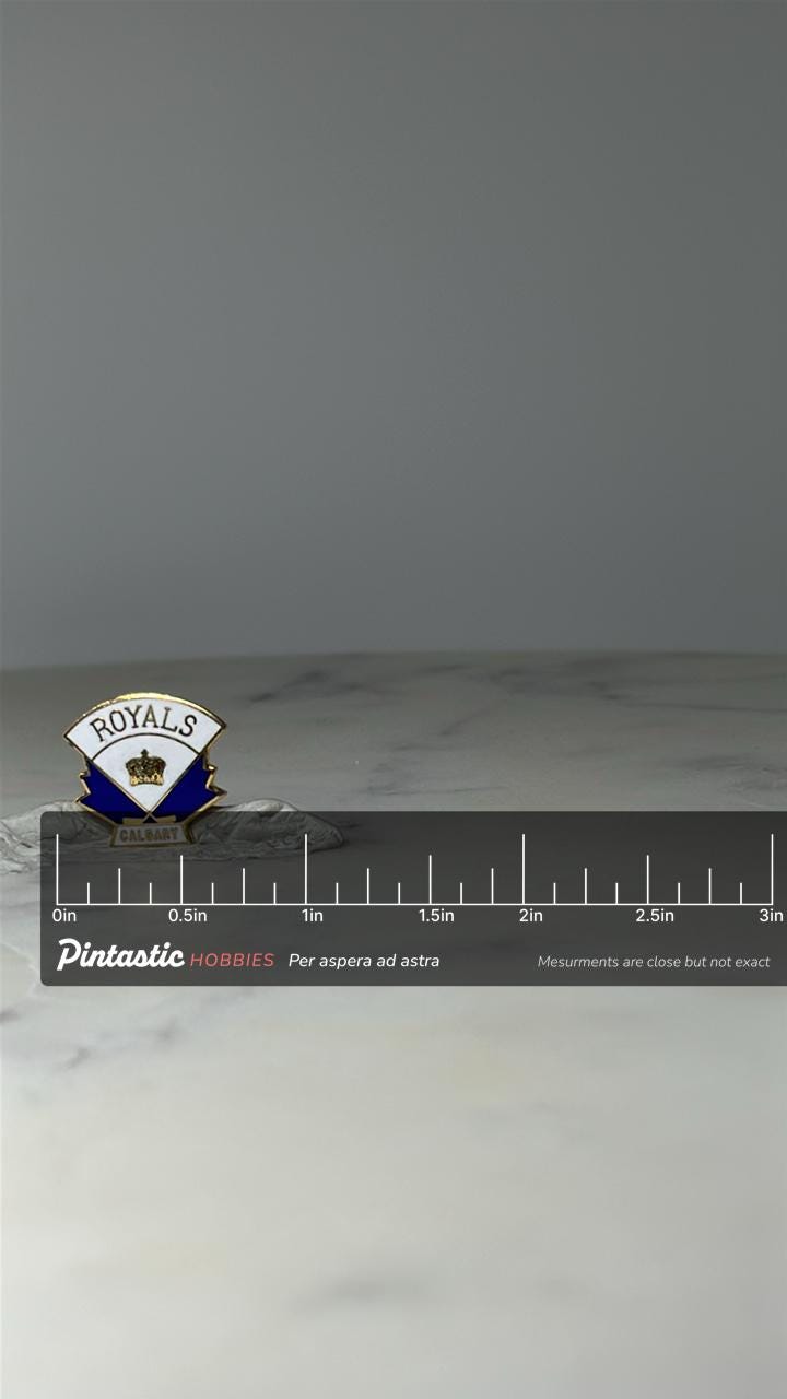 Calgary Royals Enamel Youth Hockey Team Lapel Pin: Blue White Gold - Canada Souvenir Accessory with ruler overlay for size re