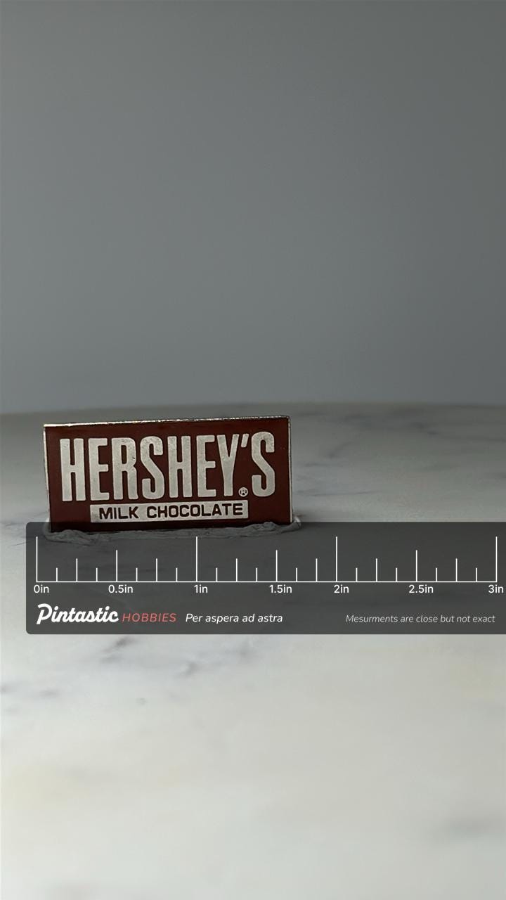 Vintage Hershey’s Milk Chocolate Bar Pin: Brown Enamel - Candy Advertising Accessory with ruler overlay for size reference