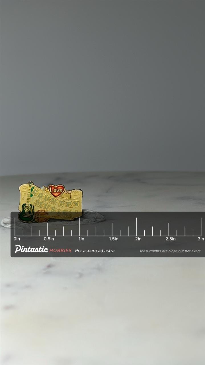 Vintage Country Music Enamel Pin: Gold Tone - Western Theme Accessory with ruler overlay for size reference